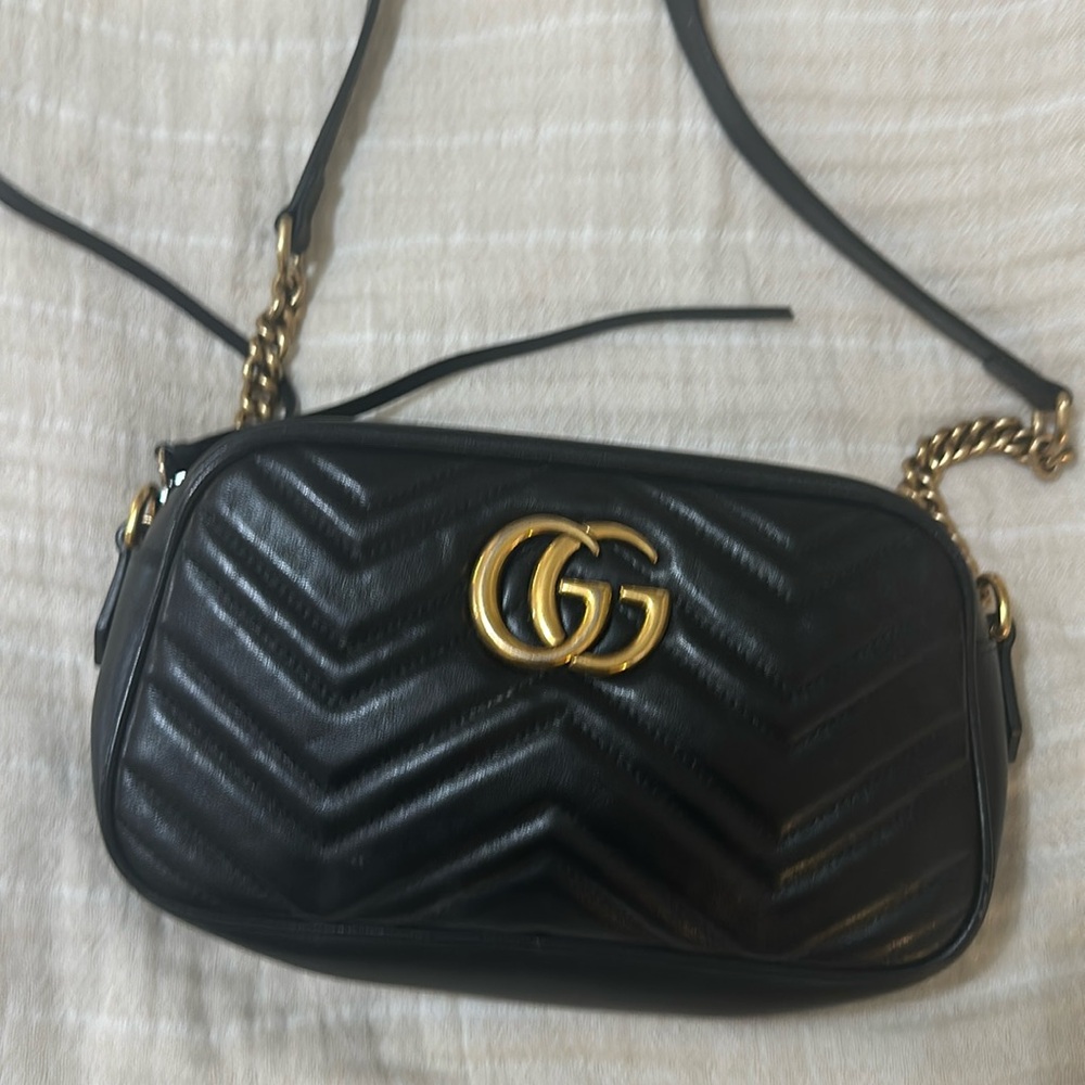 Authentic beautiful purse just sitting in my closet nothing wrong with it.